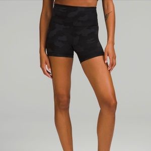 Lululemon 4’ Black Wunder Train shorts.